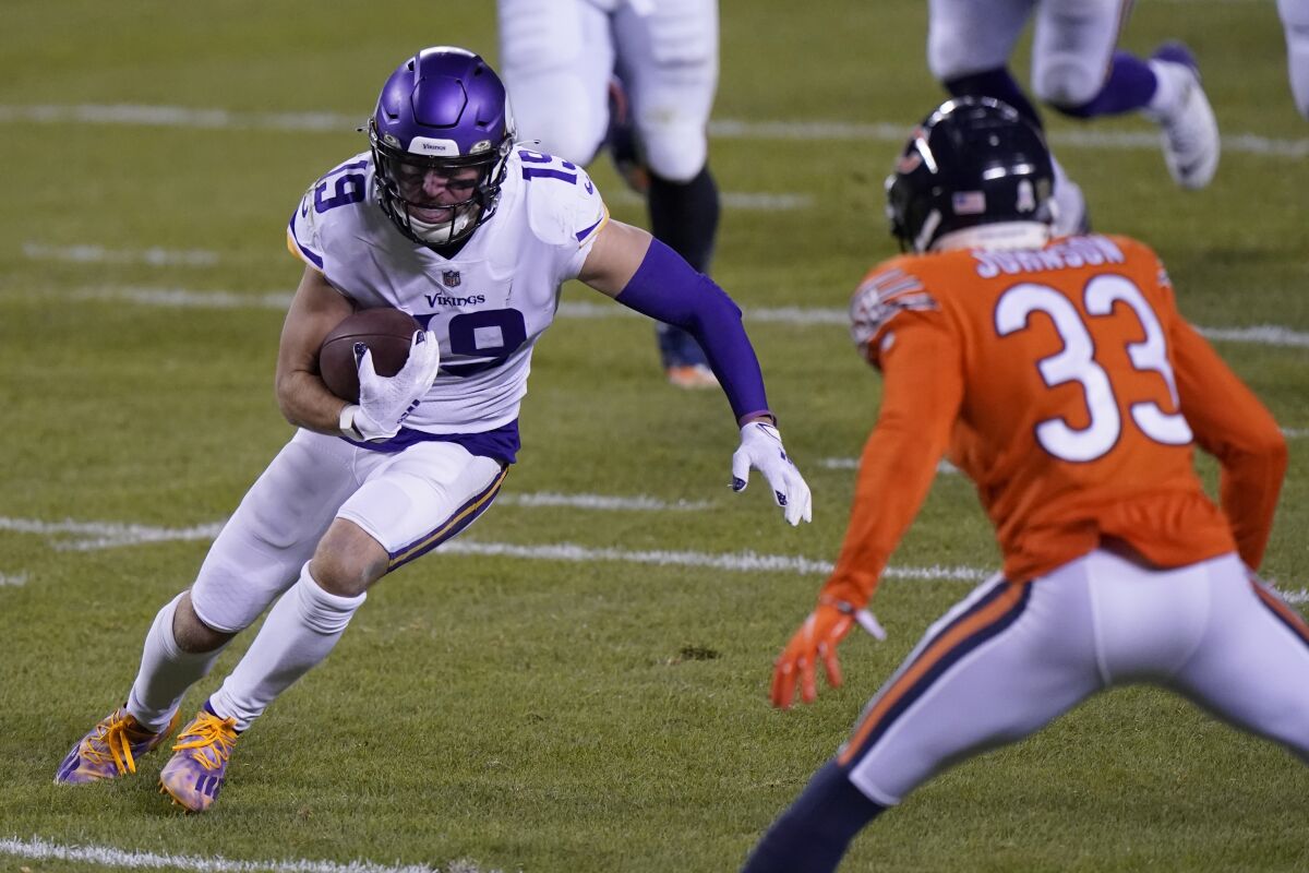 Minnesota Vikings wide receiver Adam Thielen tries to get past Chicago Bears cornerback Jaylon Johnson on Nov. 16.