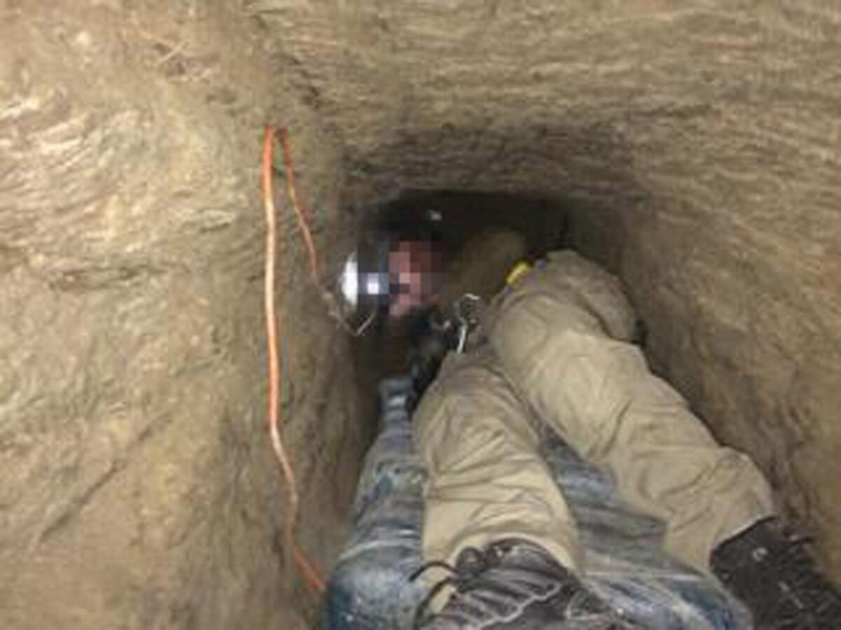A narrow passageway of what is believed to be the longest cross-border tunnel discovered along the California-Mexico border, (U.S. attorney's office)