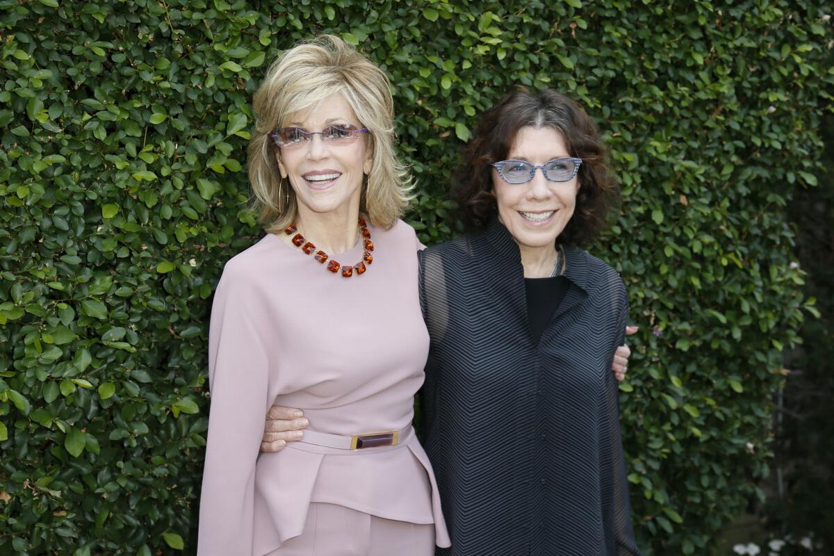 Jane Fonda, left, and Lily Tomlin, attend the Rape Foundation's annual brunch in Beverly Hills on Sunday.