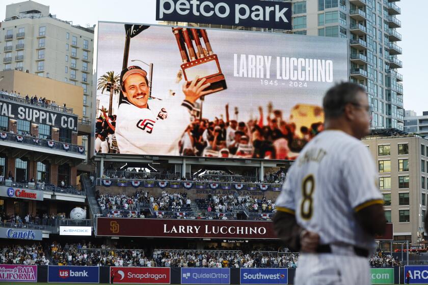 San Diego CA - April 2: A moment of silence was held for Larry Lucchino before the San Diego Padres played the St. Louis Cardinals at Petco Park on Tuesday, April 2, 2024. (K.C. Alfred / The San Diego Union-Tribune)