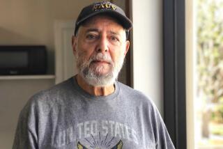 Phil Friedman poses in a clubhouse at his retirement community in Seal Beach, Ca. The 80-year-old Republican and Jewish American says he's disturbed by the rise of hate speech and bias crimes in the U.S. But he's also worried that the Democrats could steer the nation toward socialism, in Seal Beach on Friday, Nov. 4, 2022.