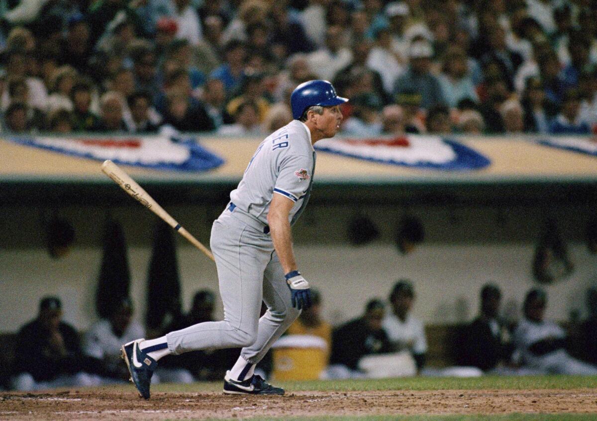 Mickey Hatcher gets a base hit in Game 5 of the 1988 World Series. 