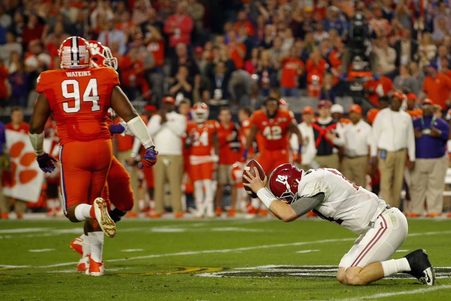 Alabama quarterback Jake Coker reacts after getting sacked by Clemson's Shaq Lawson in the second quarter.