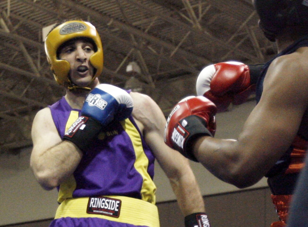 Tamerlan Tsarnaev, left, fights Lamar Fenner at the 2009 Golden Gloves National Boxing Tournament in Salt Lake City.
