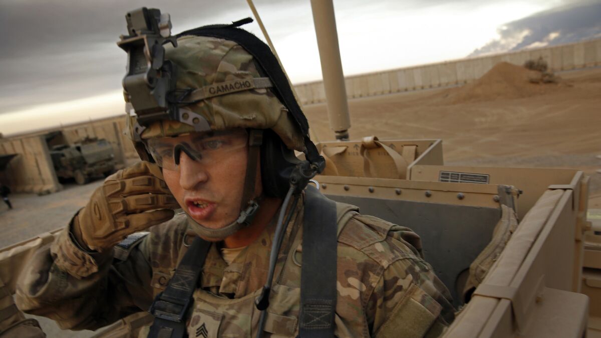 Sgt. Alex Camacho, 26, of Fontana, Calif., is on his first deployment in Iraq. He's with the 101st Division 2nd Brigade of the 126th Infantry. More than 1,000 coalition forces are working working with Iraqi forces at Qayyarah West airfield.