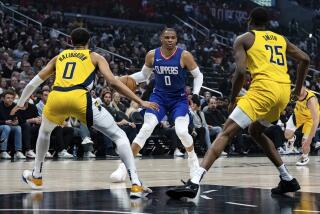 Los Angeles Clippers guard Russell Westbrook (0) controls the ball against Indiana Pacers.