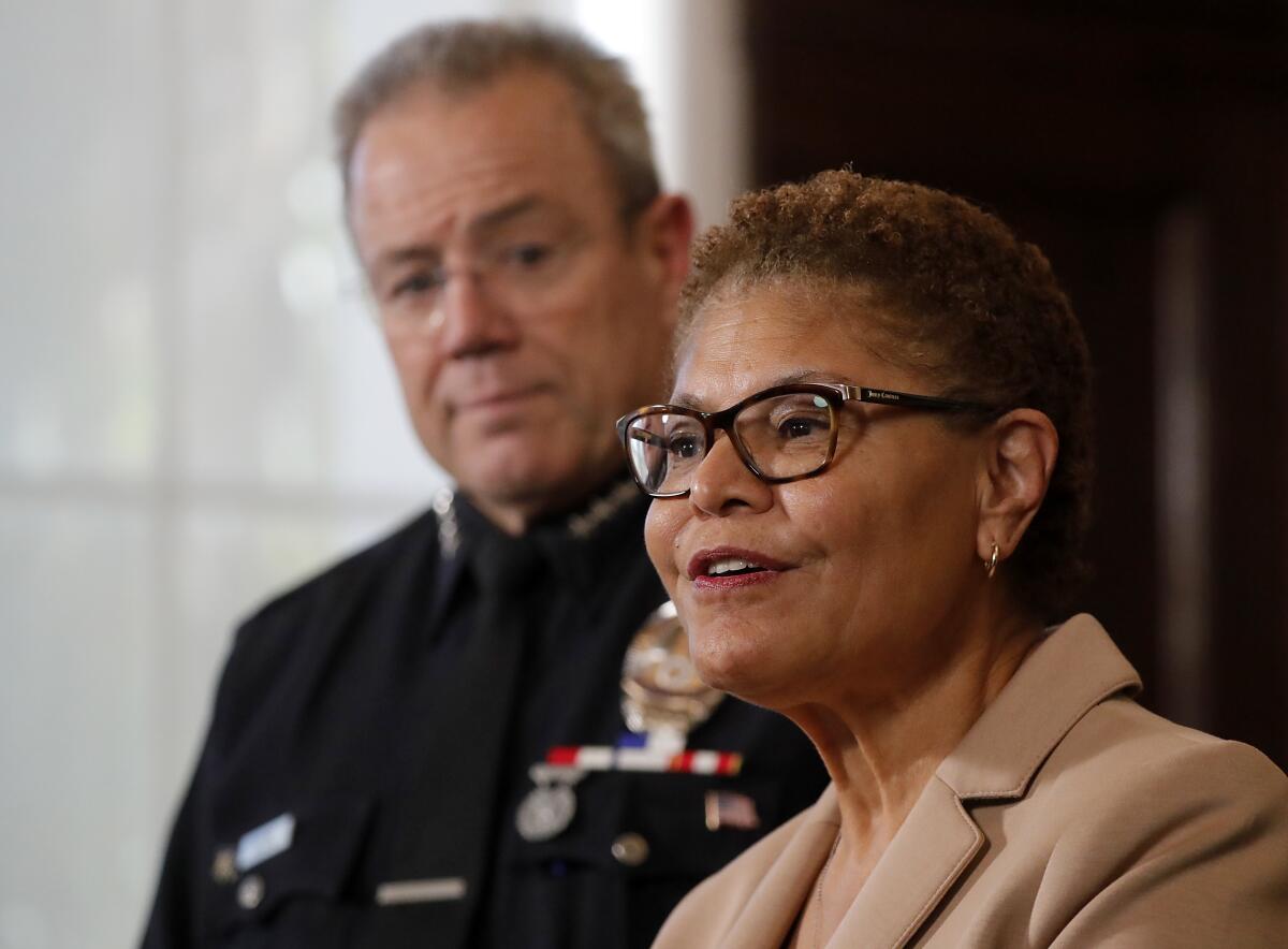 Los Angeles, CA - Los Angeles Mayor Karen Bass, right, and Los Angeles Police Department Chief Michel Moore hold a press conference at L.A. City Hall on Friday, Jan. 12, 2024, to announce the chief's retirement, pending a replacement. (photographer} / Los Angeles Times