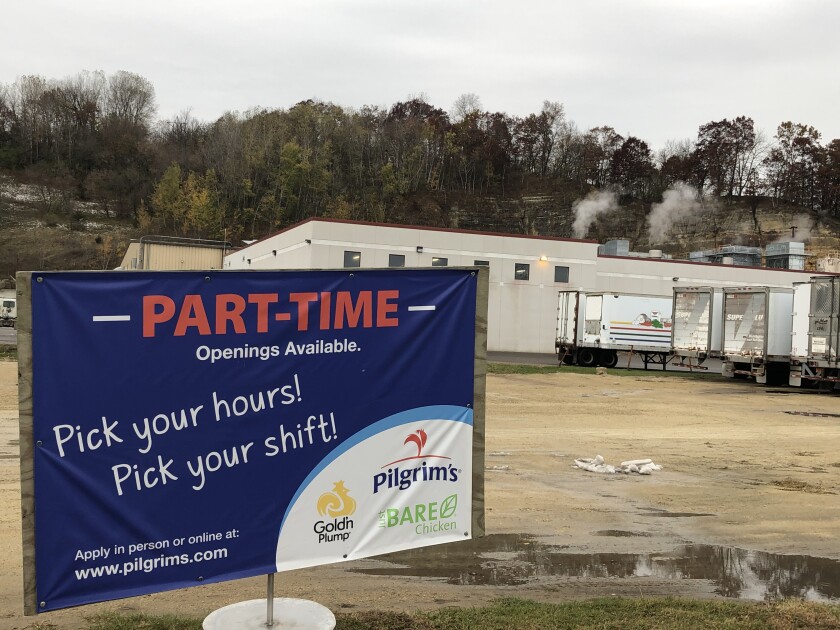 A help-wanted sign outside the Pilgrim's Pride poultry processing plant in Arcadia, Wis.