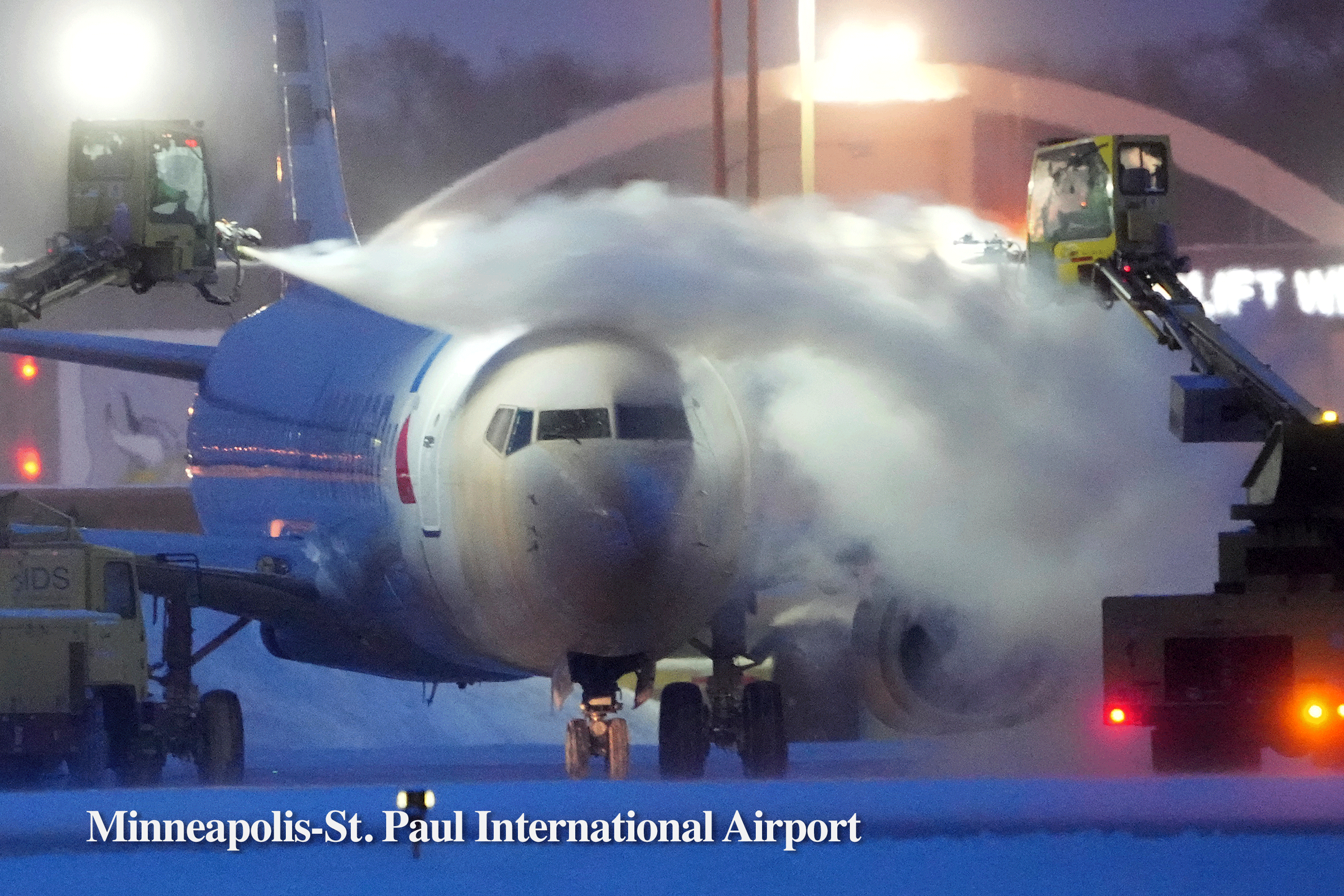 A plane is de-iced at Minneapolis-St. Paul International Airport and sun set in Long Beach