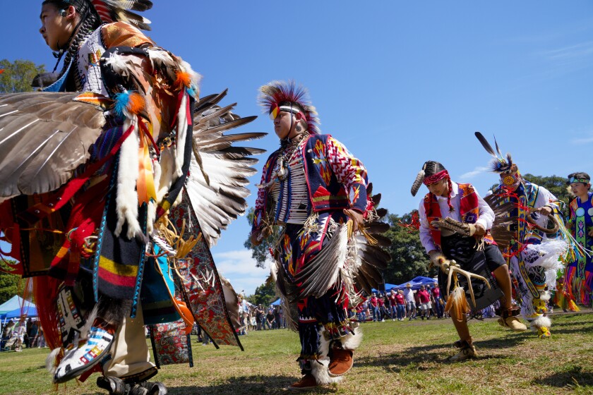 Dancers take part in the Balboa Park Powwow Grand Entry in 2021.