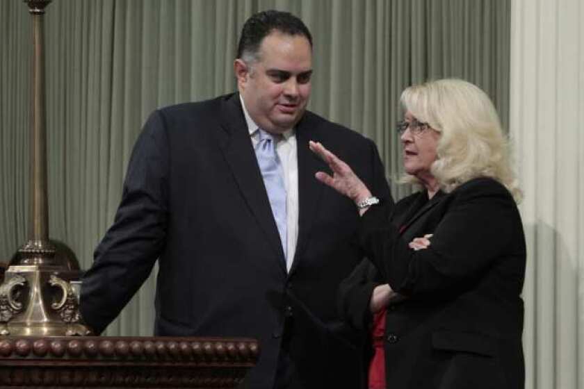 Assembly Speaker John A. Pérez (D-Los Angeles), left, and Assembly Republican leader Connie Conway (R-Tulare) confer at the Capitol in May 2011.