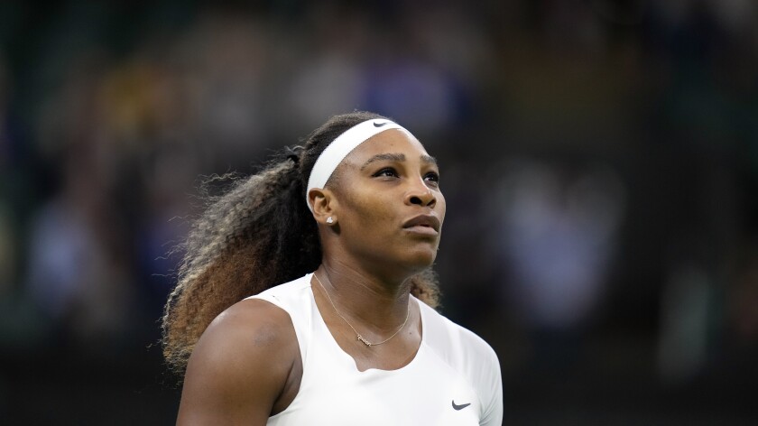 Closeup of a female tennis player on court.