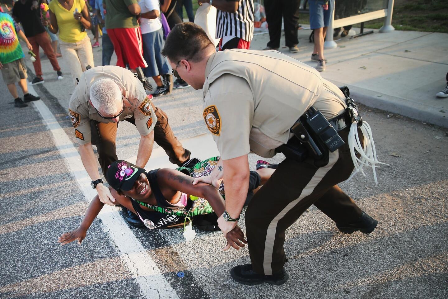 Surveillance shows looting of shoe store near Ferguson night after