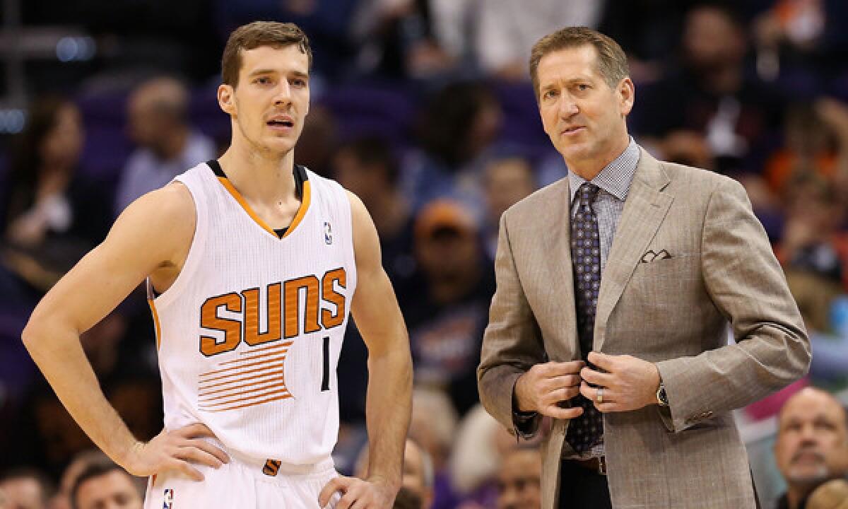 Phoenix Suns guard Goran Dragic, left, speaks with Coach Jeff Hornacek during a win over the Lakers on Jan. 15.