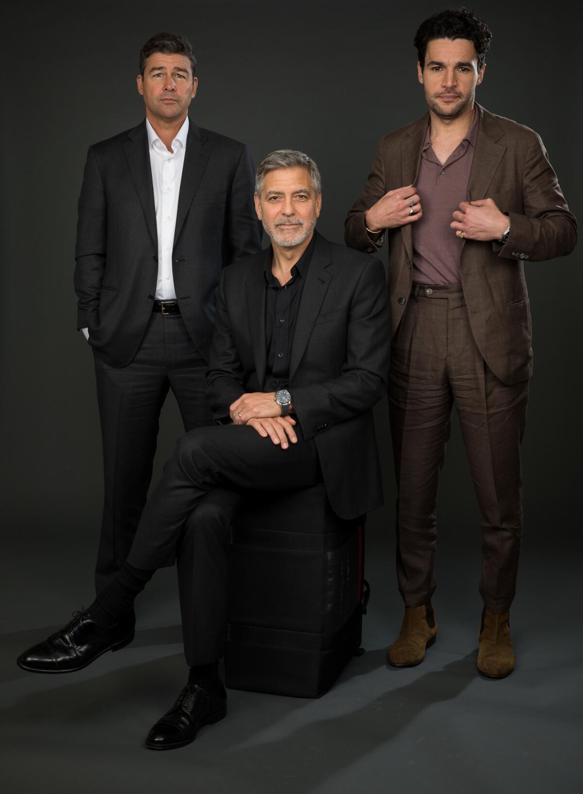 Starring together in Hulu's "Catch 22," from left, Kyle Chandler, George Clooney and Chris Abbott. Clooney directs the adaptation of Joseph Heller's satirical novel.