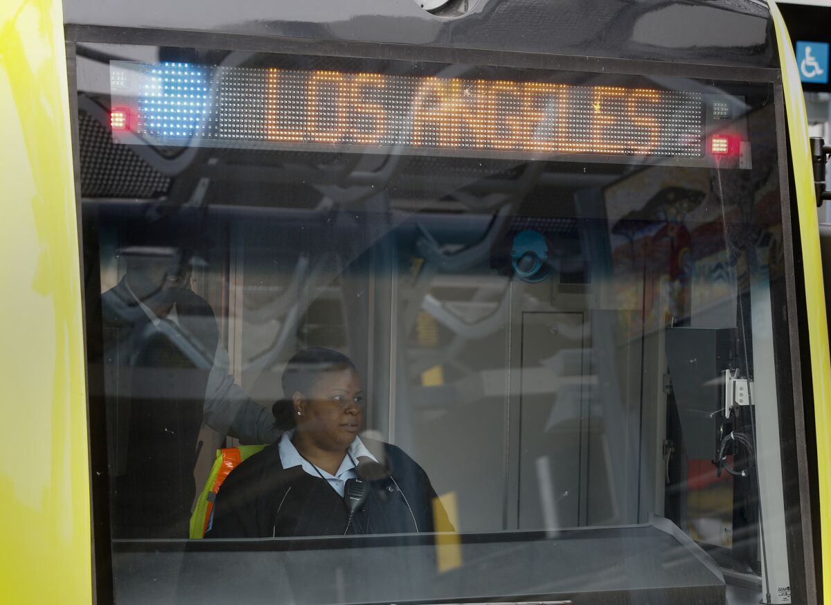 An Expo Line Metro train operator goes on a practice run from the downtown Santa Monica station on Thursday.