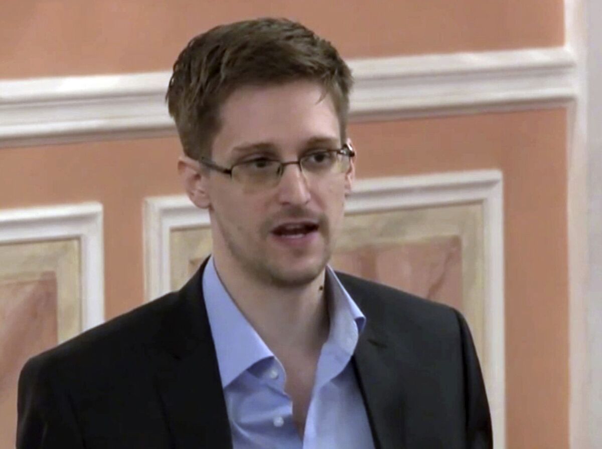 Former National Security Agency systems analyst Edward Snowden speaks in Moscow in 2013.