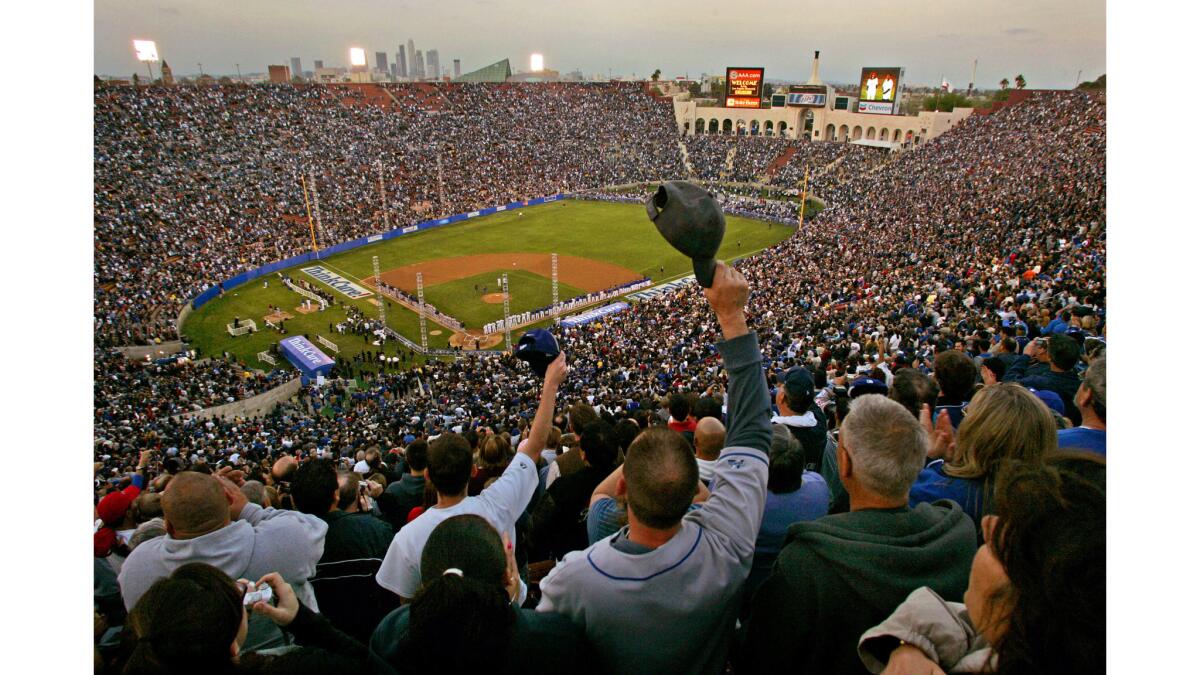 March 29, 2008: Fans crowd Memorial Coliseum for an exhibition game between the Dodgers and the Boston Red Sox. The Red Sox won 7-4.