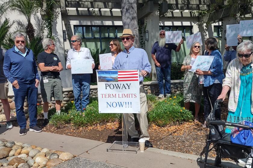 Poway resident Arthur “Tony” Blain announces a term limits petition with supporters at a May 8 press conference at City Hall.