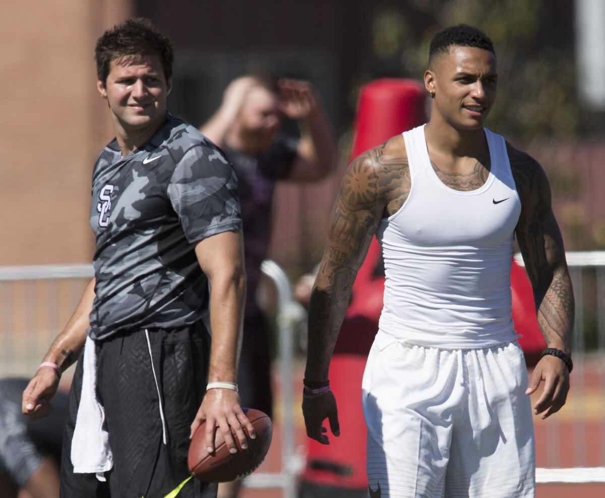 USC pro prospects quarterback Cody Kessler, left, and linebacker/safety Su'a Cravens, right, during the Trojans' annual NFL pro day.