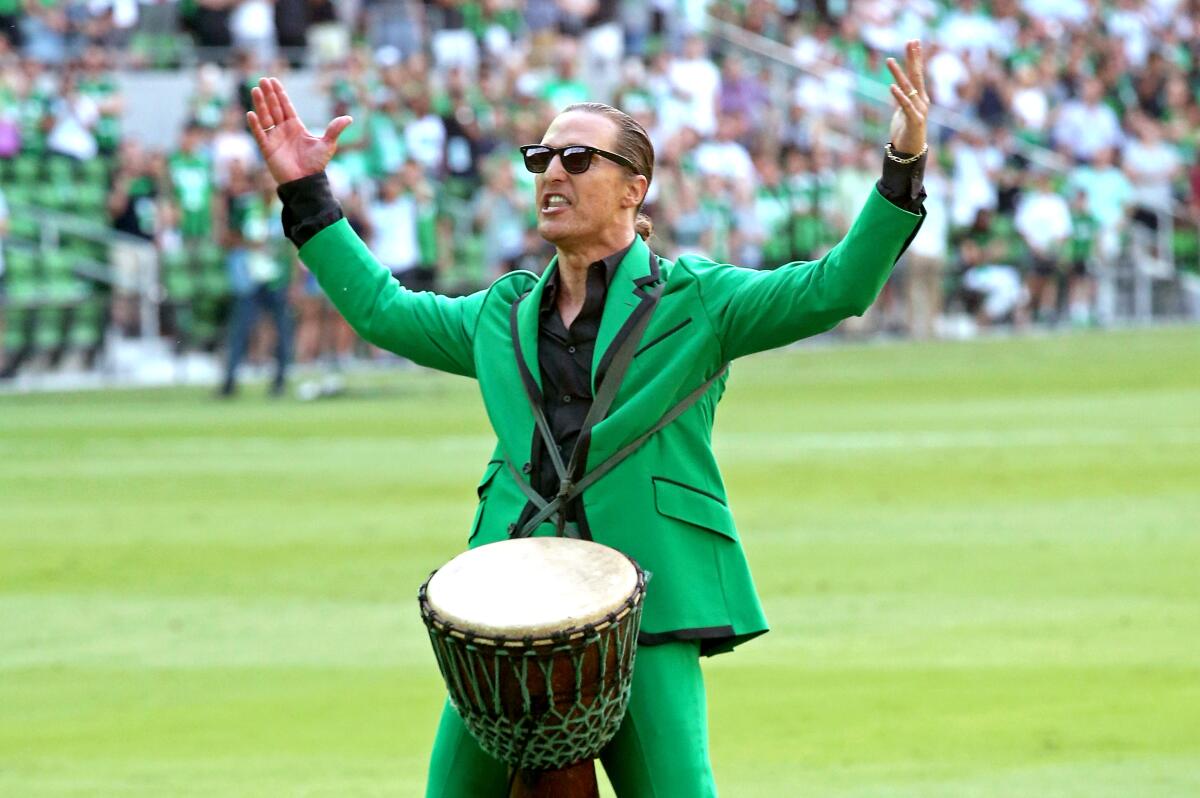Matthew McConaughey performs before the start of the inaugural home game between the San Jose Earthquakes and Austin FC