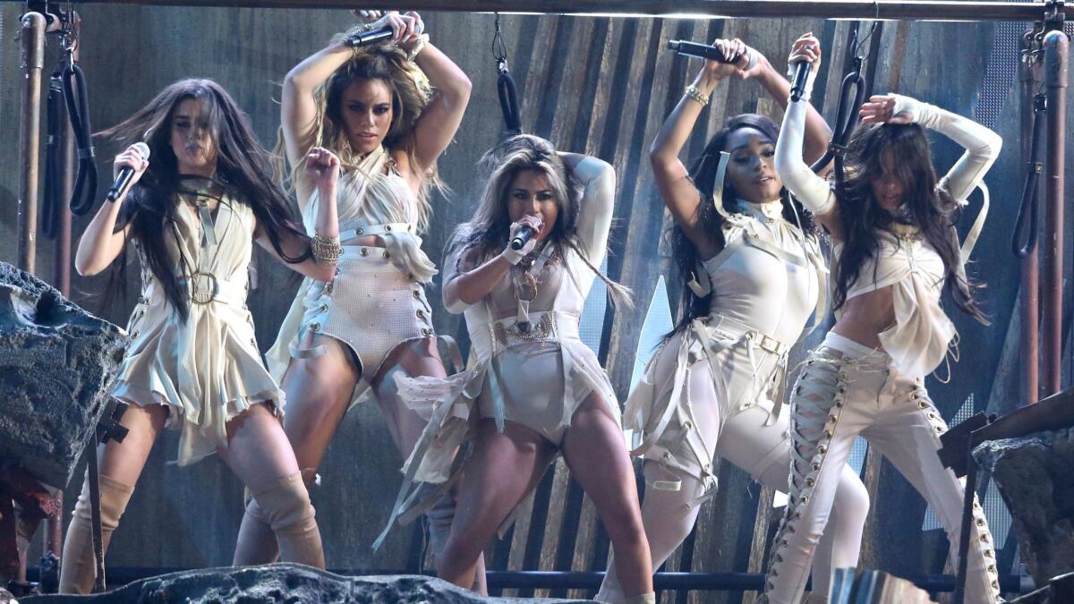 Lauren Jauregui, Dinah Jane, Ally Brooke, Camila Cabello and Normani Kordei of Fifth Harmony perform at the American Music Awards.