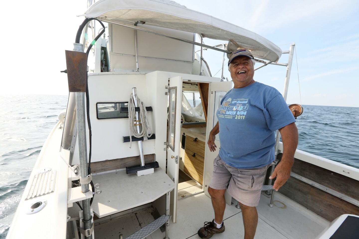 Shipwreck enthusiast Steve Radovan, of Sheboygan, Wis., aboard his boat Wednesday, Aug. 9, 2017, in Lake Michigan. An avid underwater explorer since the mid-1970's and discoverer of sunken ships, Radovan is a strong advocate for a proposed national marine sanctuary for Lake Michigan.