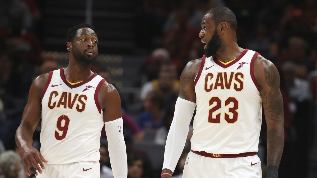 LeBron James, right, and Dwyane Wade are together again, this time as members of the Cleveland Cavaliers.