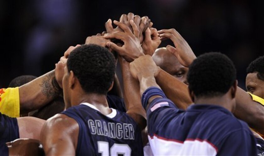 Members of the USA team huddle after their game against Iran in the preliminary round of the World Basketball Championship, Wednesday, Sept. 1, 2010, in Istanbul, Turkey. (AP Photo/Mark J. Terrill)