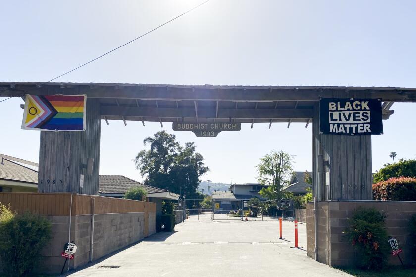 A rainbow flag hangs outside of the Pasadena Buddhist Temple in Pasadena, Calif., on Wednesday, April 26, 2023. (Ren Gibbs)