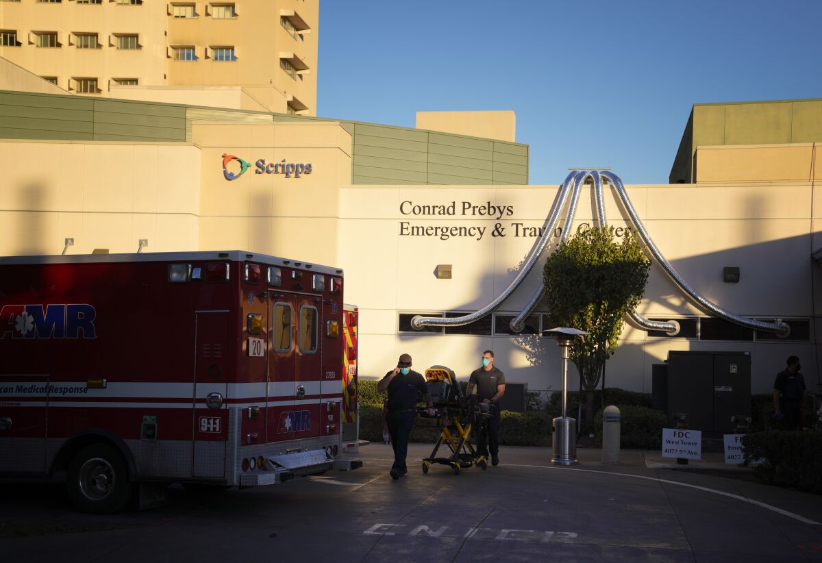Emergency crews exit Scripps Mercy Hospital in Hillcrest in 2020.