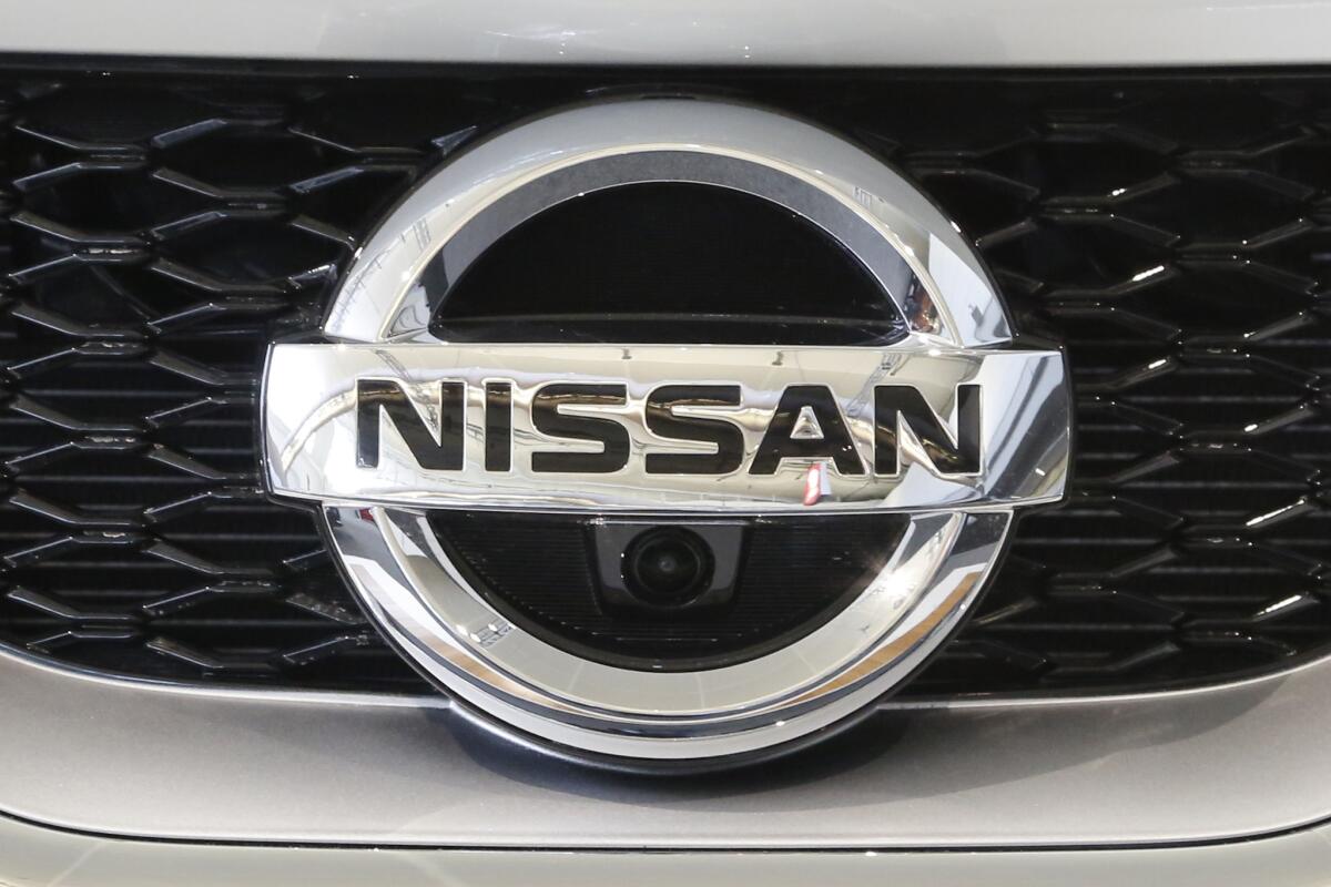 Nissan, whose logo is shown in this 2016 file photo, is recalling more than 120,000 cars and SUVs in the U.S.