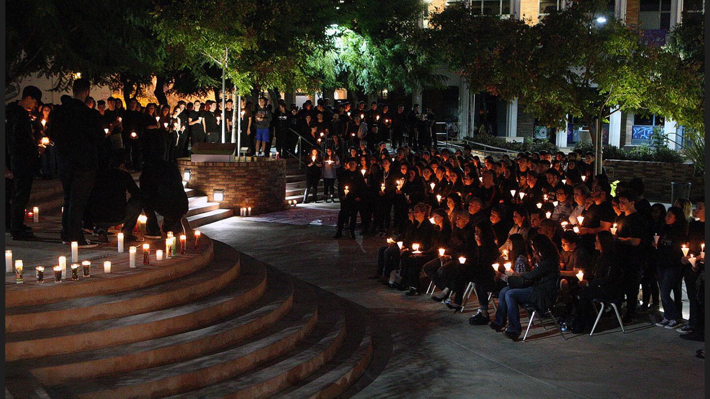 A candlelight vigil to remember schoolmate Eric Sarokhanian in the quad at Hoover High School on Wednesday, October 12, 2016. About 200 students surrounded the quad with candles with a center ring for students could talk about their memories. Sarokhanian was killed Monday night in a motorcycle collision.