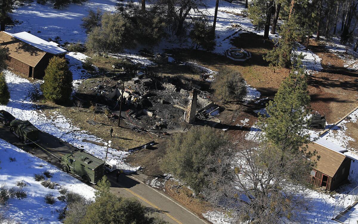 The remains of the burned out Big Bear cabin where Christopher Dorner shot himself during a police standoff.