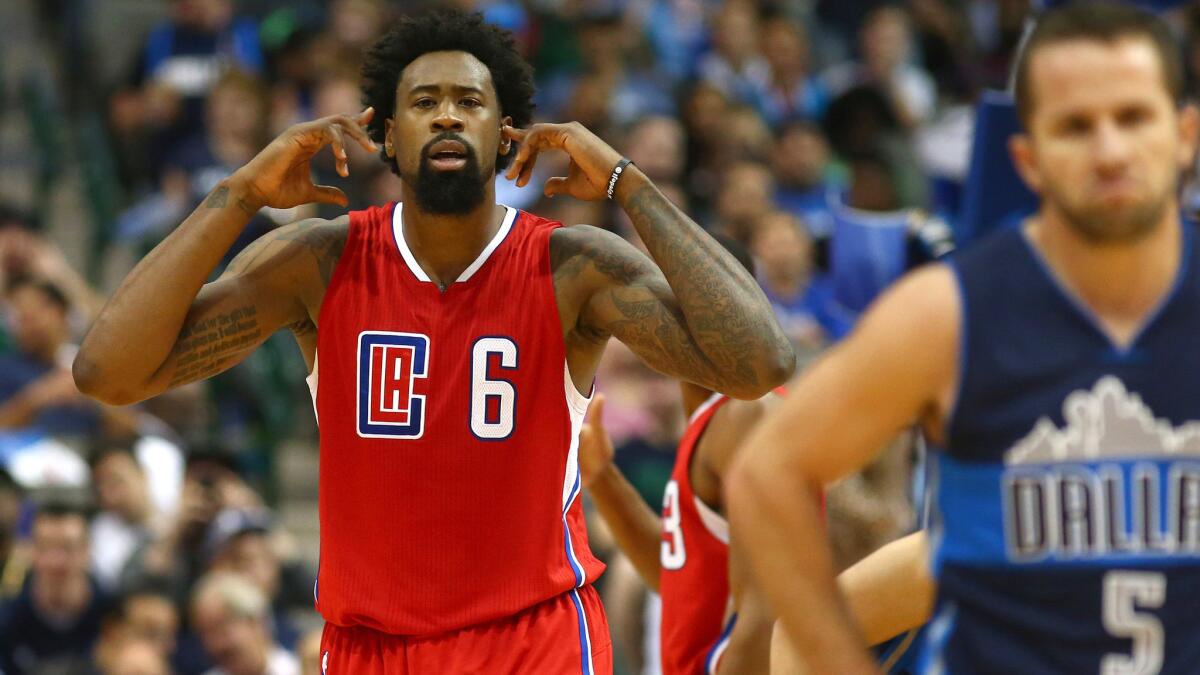 Clippers center DeAndre Jordan reacts to Mavericks fans booing him during the game on Nov. 11, 2015, in Dallas.