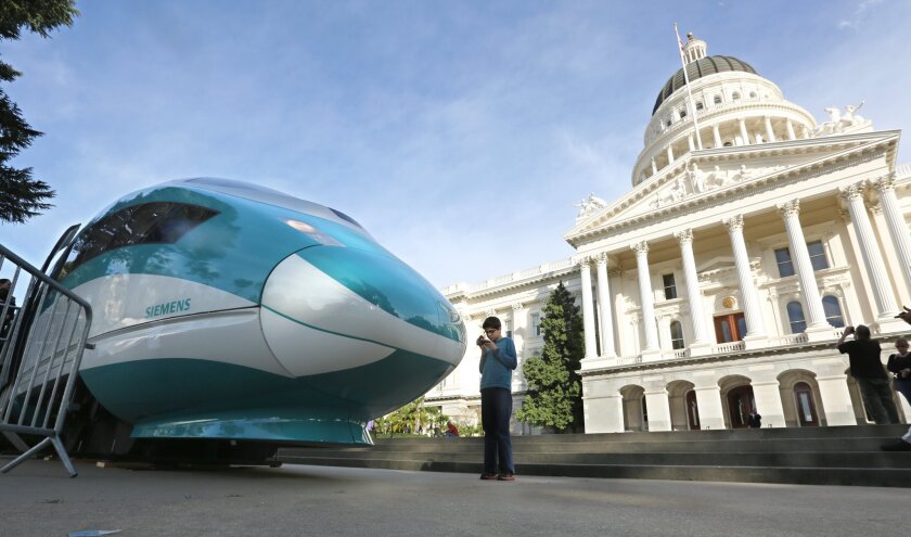 A full-scale mock-up of a high-speed train is displayed at the state Capitol in Sacramento last fall. Project officials now plan to build the rail system's first leg from San Jose to Bakersfield rather than in Southern California.