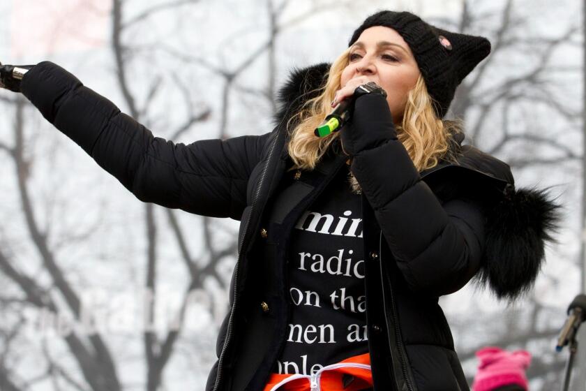 Madonna performs on stage during the Women's March rally, Saturday, Jan. 21, 2017, in Washington. Madonna, Julia Roberts, Scarlett Johansson, Cher, Alicia Keys, Katy Perry, Emma Watson, Amy Schumer, Jake Gyllenhaal and feminist leader Gloria Steinem were some of the Hollywood A-list celebrities in attendance at the march in Washington. (AP Photo/Jose Luis Magana)