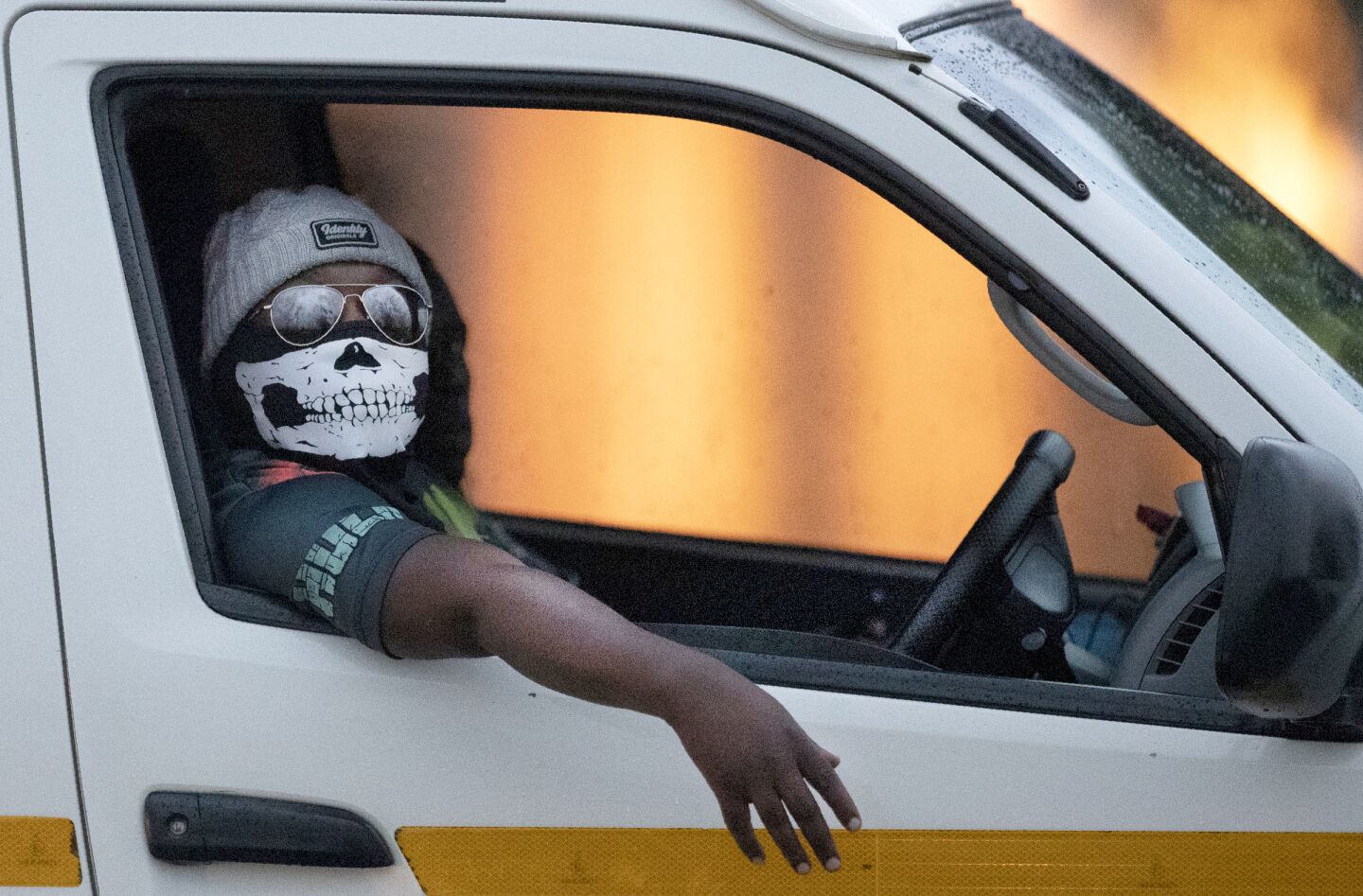 South Africa: A minibus taxi driver wearing a face mask looks on during his journey in Johannesburg, South Africa.