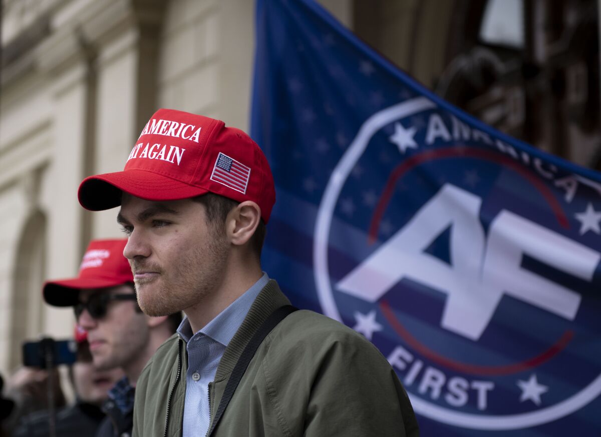 Nick Fuentes, far-right activist, holds a rally at the state Capitol, in Lansing, Mich., Nov. 11, 2020.