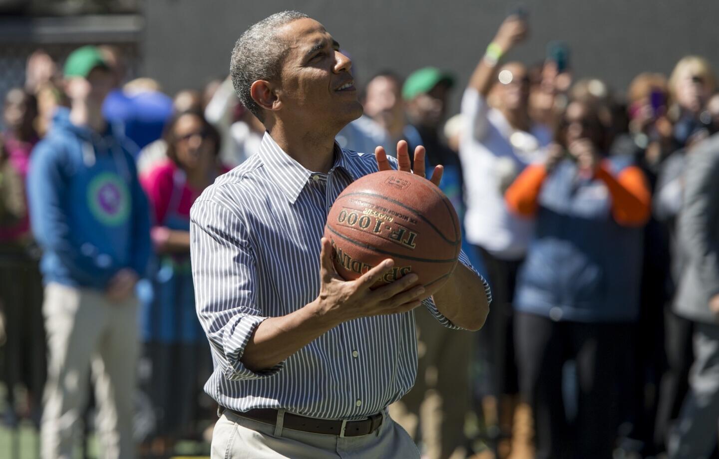 President Obama shoots a basket during the annual Easter Egg Roll on April 1, 2013, on the South Lawn of the White House in Washington, D.C.