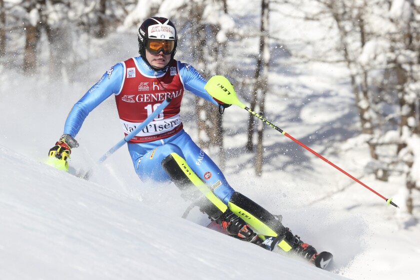 Italy's Alex Vinatzer competes in the first run of an alpine ski, men's World Cup slalom, in Val D'Isere, France, Sunday, Dec. 12, 2021. (AP Photo/Alessandro Trovati)