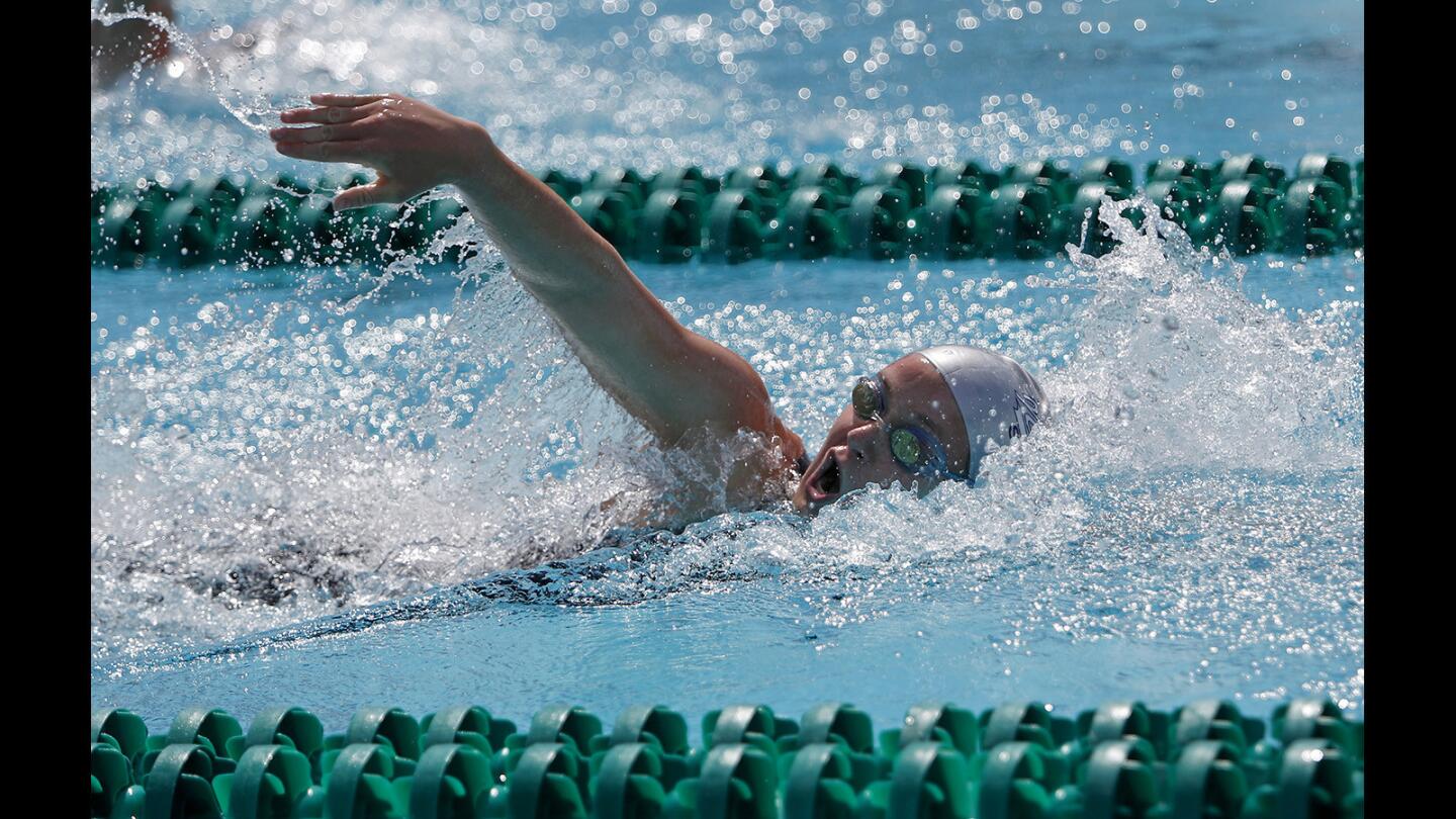 Newport Harbor High's Ayla Spitz competes in the girls' 200-yard freestyle race during the Sunset League finals at Golden West College in Huntington Beach on Friday, May 4. Spitz placed first with a time of 1:45.44.