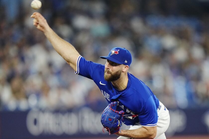 Toronto Blue Jays relief pitcher Anthony Bass works against the Milwaukee Brewers during the ninth inning of a baseball game Wednesday, May 31, 2023, in Toronto. (Frank Gunn/The Canadian Press via AP)