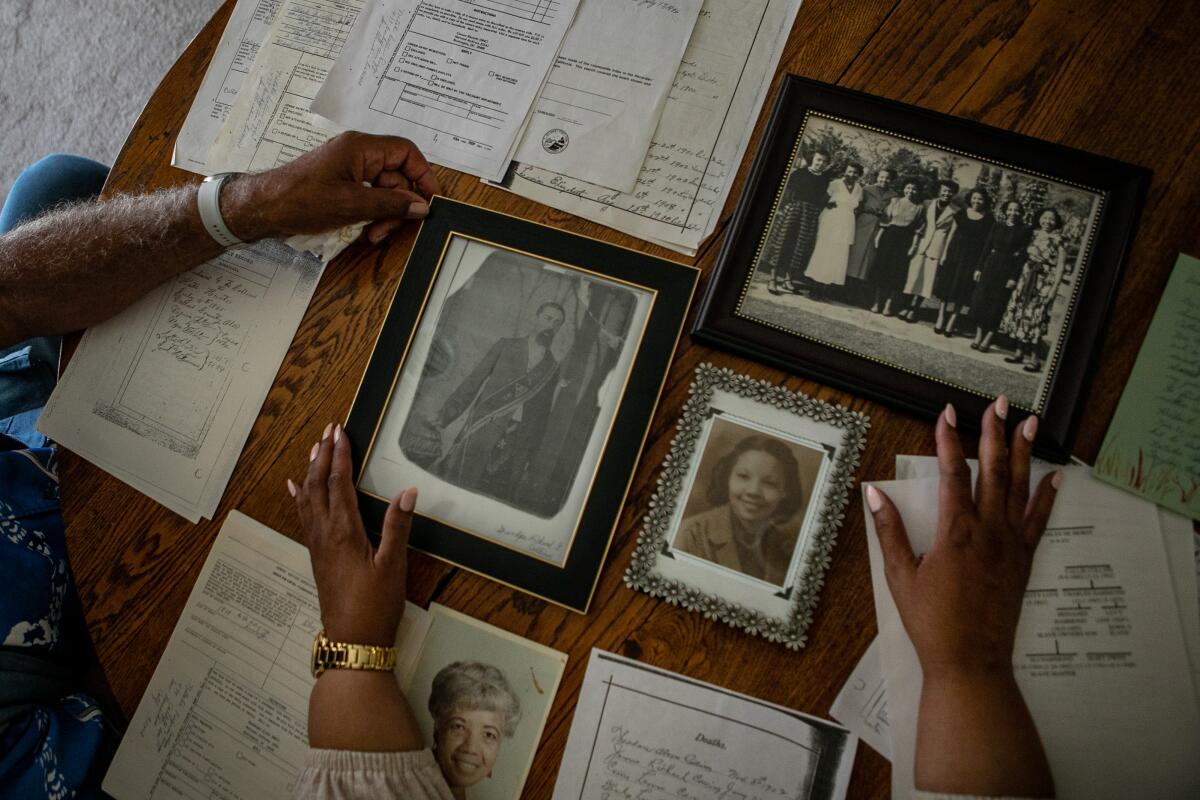 Old family documents and photos on a table