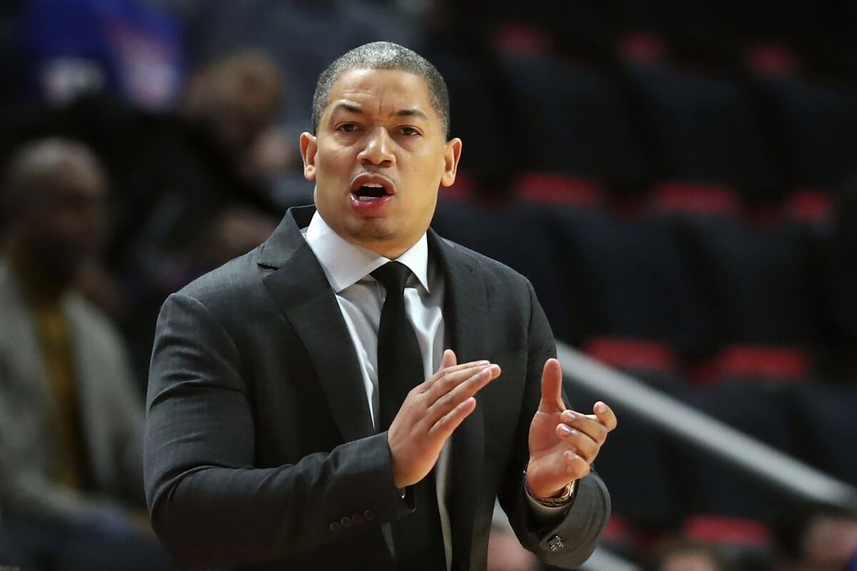 Cavaliers coach Tyronn Lue claps during the first half of a game against Detroit on Oct. 25, 2018.