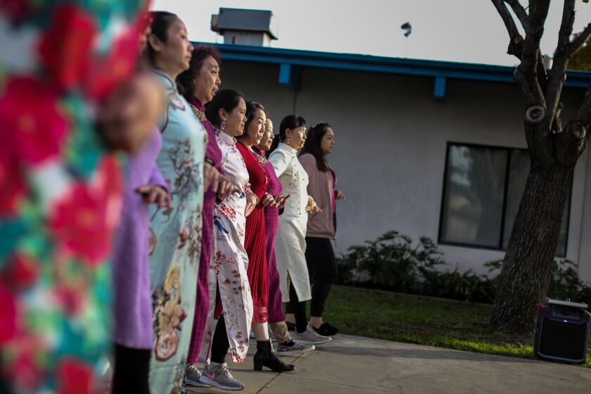 Monterey Park, CA - January 12: A group of women practice for a dance compeition, at Barnes Park, seen during a tour of Monterey Park, CA, with Mayor Henry Lo, Thursday, Jan. 12, 2023. The city, one of the oldest in L.A. County, has earned the title of the nation's first "suburban Chinatown."(Jay L. Clendenin / Los Angeles Times)