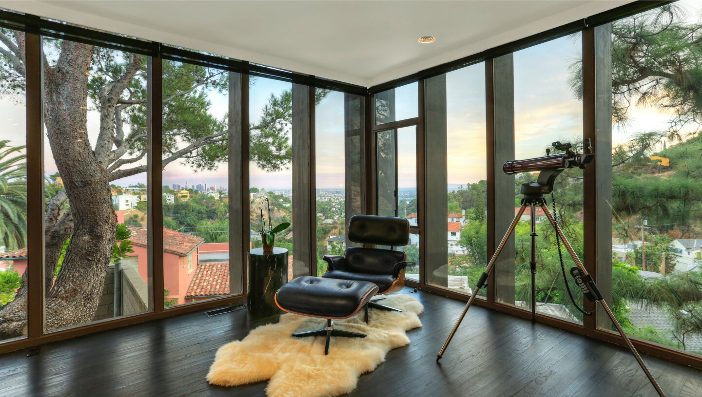 Built in 1966, the glass-covered home takes in sweeping city views across 2,300 square feet.