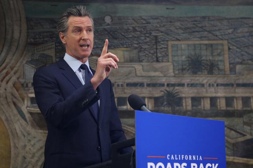 California Gov. Gavin Newsom takes part in a news conference at The Unity Council on Monday, May 10, 2021, in Oakland, Calif.