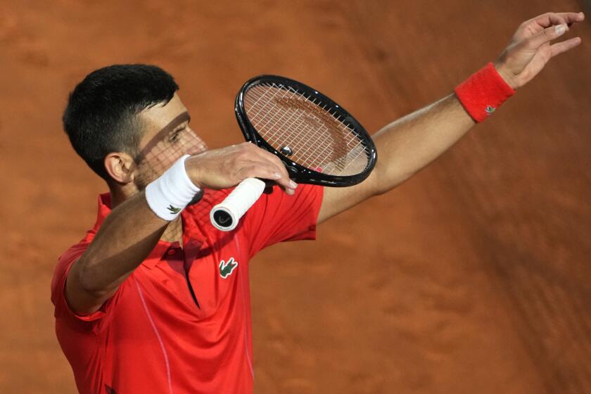 Serbia's Novak Djokovic celebrates after winning a match against France's Corentin Moutet at the Italian Open tennis tournament in Rome, Friday, May 10, 2024. (AP Photo/Alessandra Tarantino)