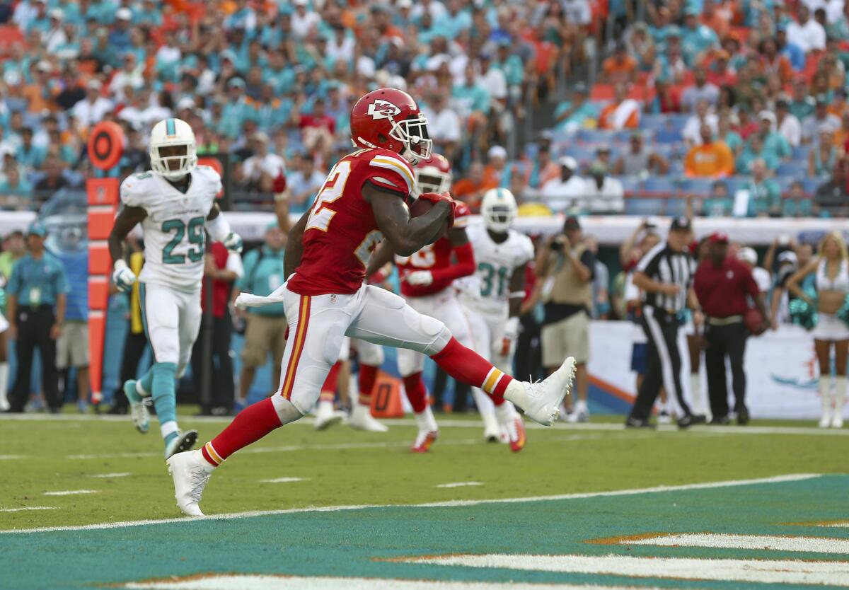 Joe McKnight of the Kansas City Chiefs scores a third-quarter touchdown, one of two TDs he scored Sunday against the Miami Dolphins.